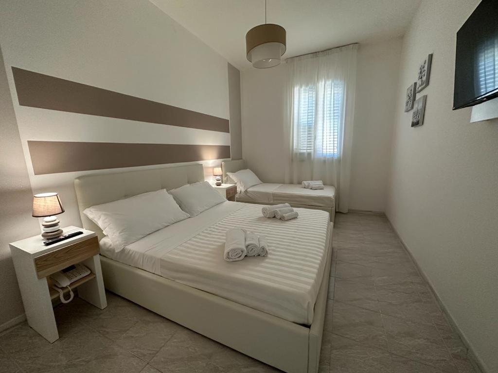 Porto Cesareo Hotel Bagian luar foto